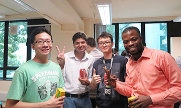 (From left) Research students Mr Edwin Yu, Mr Asif Rashid, Mr Henry Zou and Mr Emmanuel Koomson gathered at the welcome party.