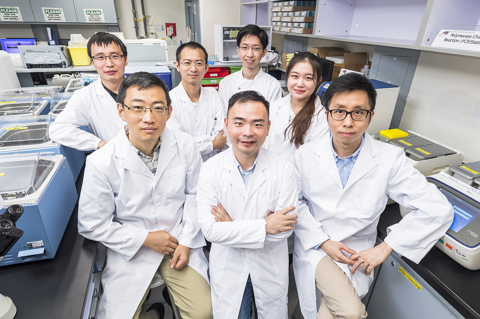 (Front row from left) Dr Zhang Liang, Dr Yan Jian and Dr Chan Kui-ming, and their team have developed CAPRID that can rapidly detect binding proteins of any target RNA in living cells.