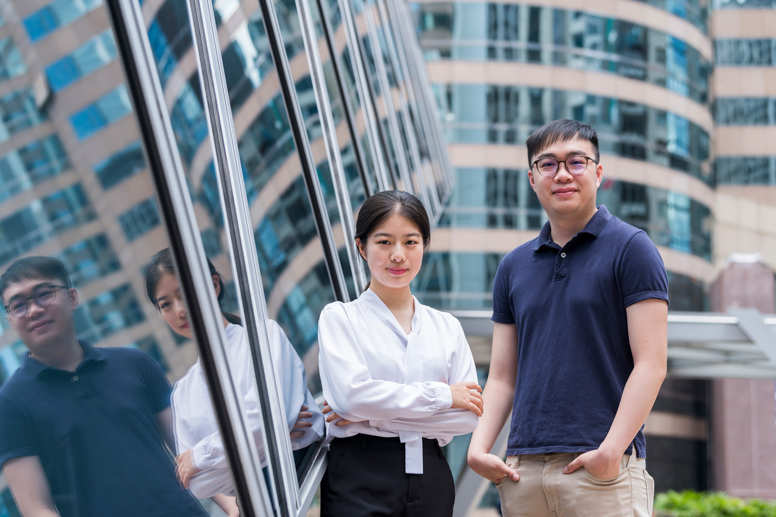 Mr Wong and Ms Yang, outstanding graduates of CityU, kick off their brilliant careers.
