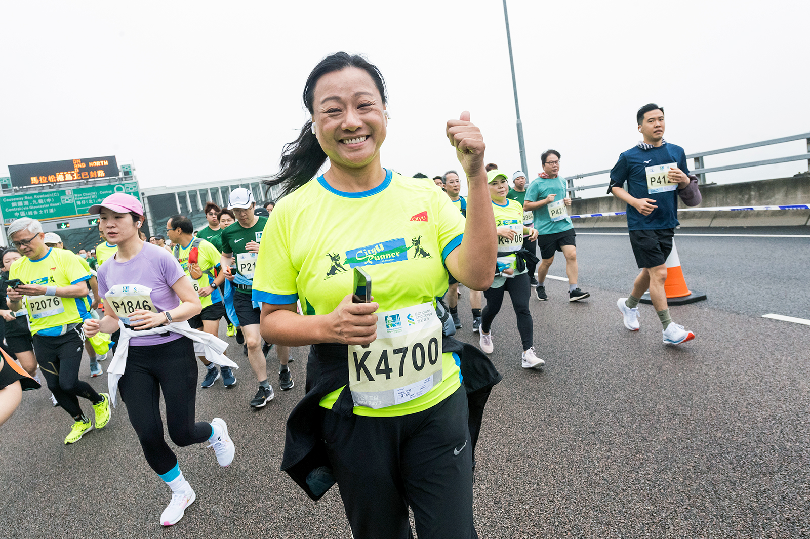 President Kuo leads CityU marathon team for 13th consecutive race