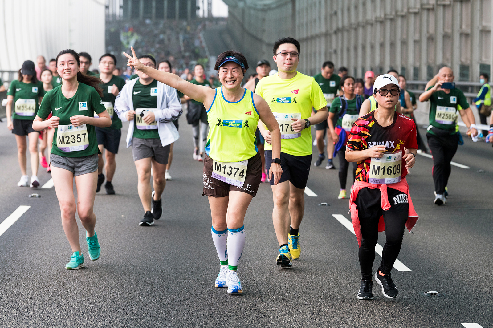 President Kuo leads CityU marathon team for 13th consecutive race
