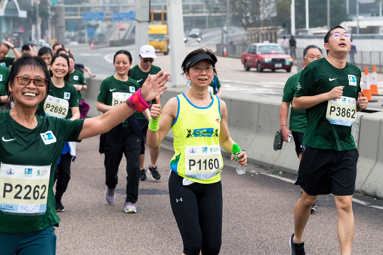President Kuo leads CityU marathon team for 13th consecutive race