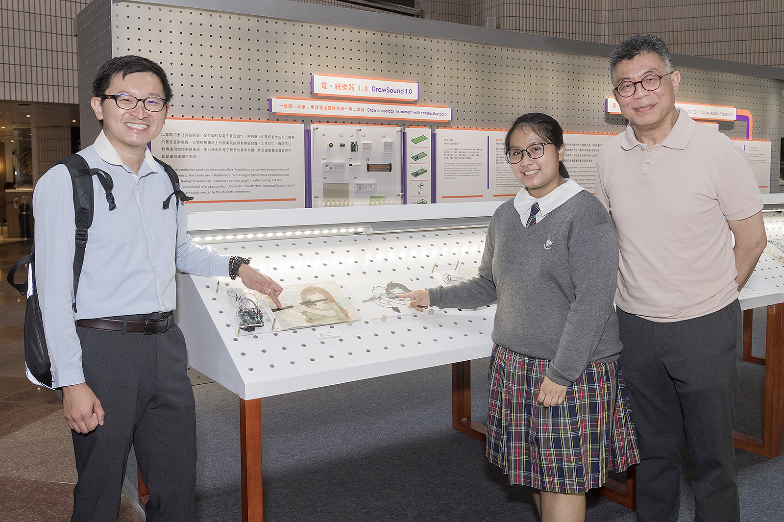 (From left) Mr Tsang Tin-yu, a teacher, Ho Tsoi-wan, a student, and Mr Chow Kan-hung, Assistant Principal, all from Tseung Kwan O Government Secondary School.