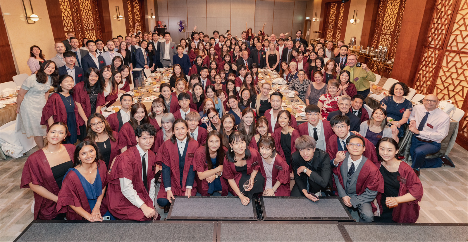 Monica (first row, centre) co-founded the Veterinary Medicine Society with her classmates to foster connections between the industry and students through various activities.