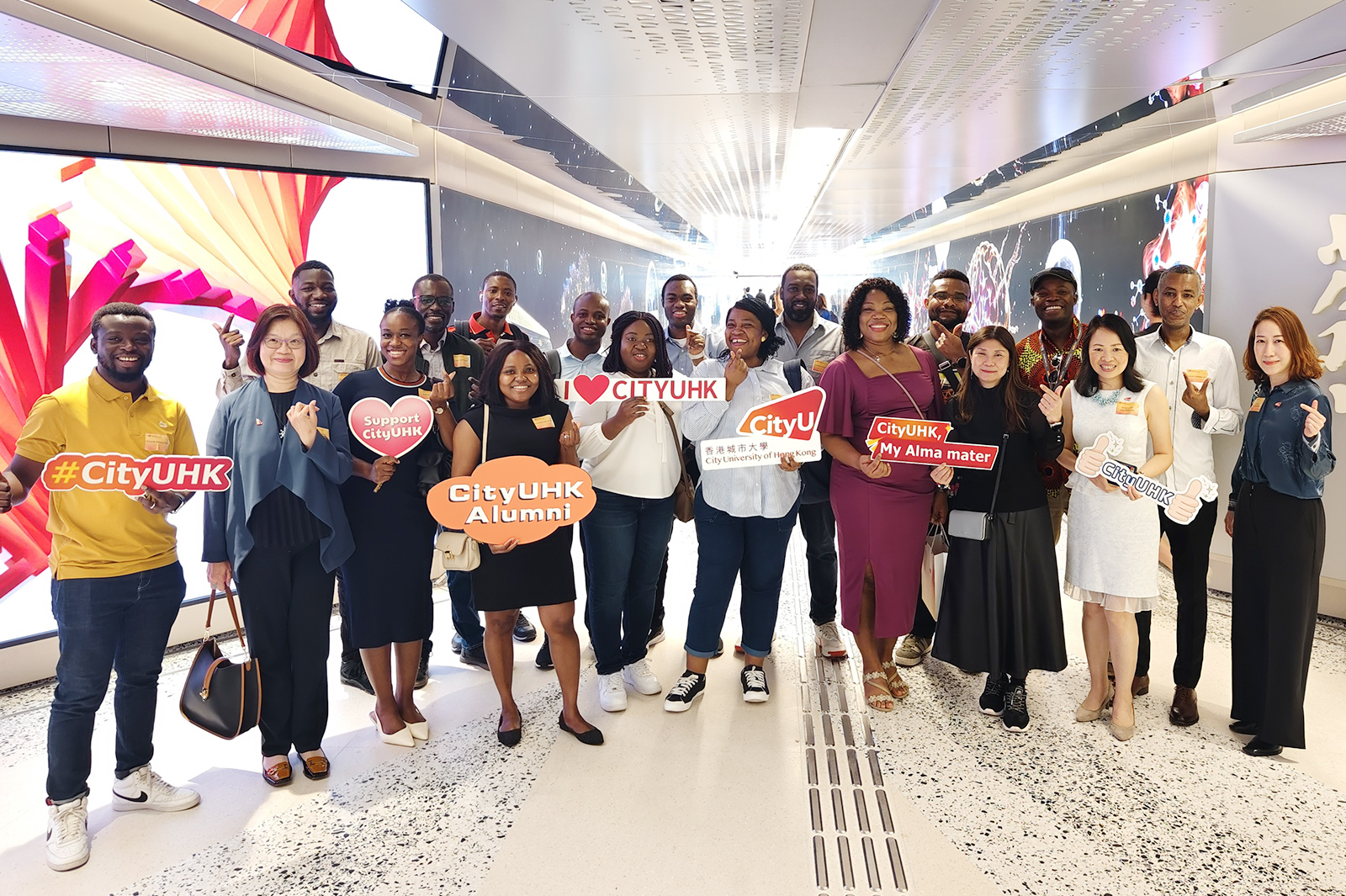 African alumni gather at the iconic campus entrance “Tunnel of Future Innovations”, marking a memorable reunion at their alma mater.