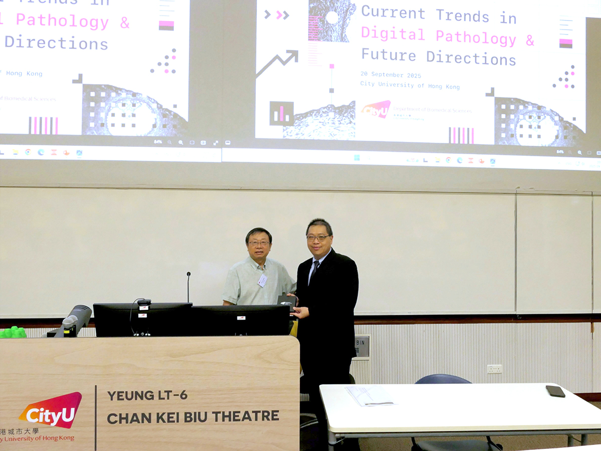 Prof. Yu Huang, Head of the Department, presents a BMS souvenir to guest speaker Dr Siu Ming Mak.