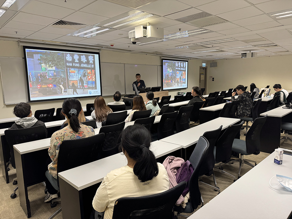 Students attentively listening to insights shared by the guest speaker.