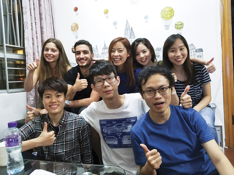 Alizé Vilbert (first from left, back row), a French expat, is invited to dine with one of the local hosts.