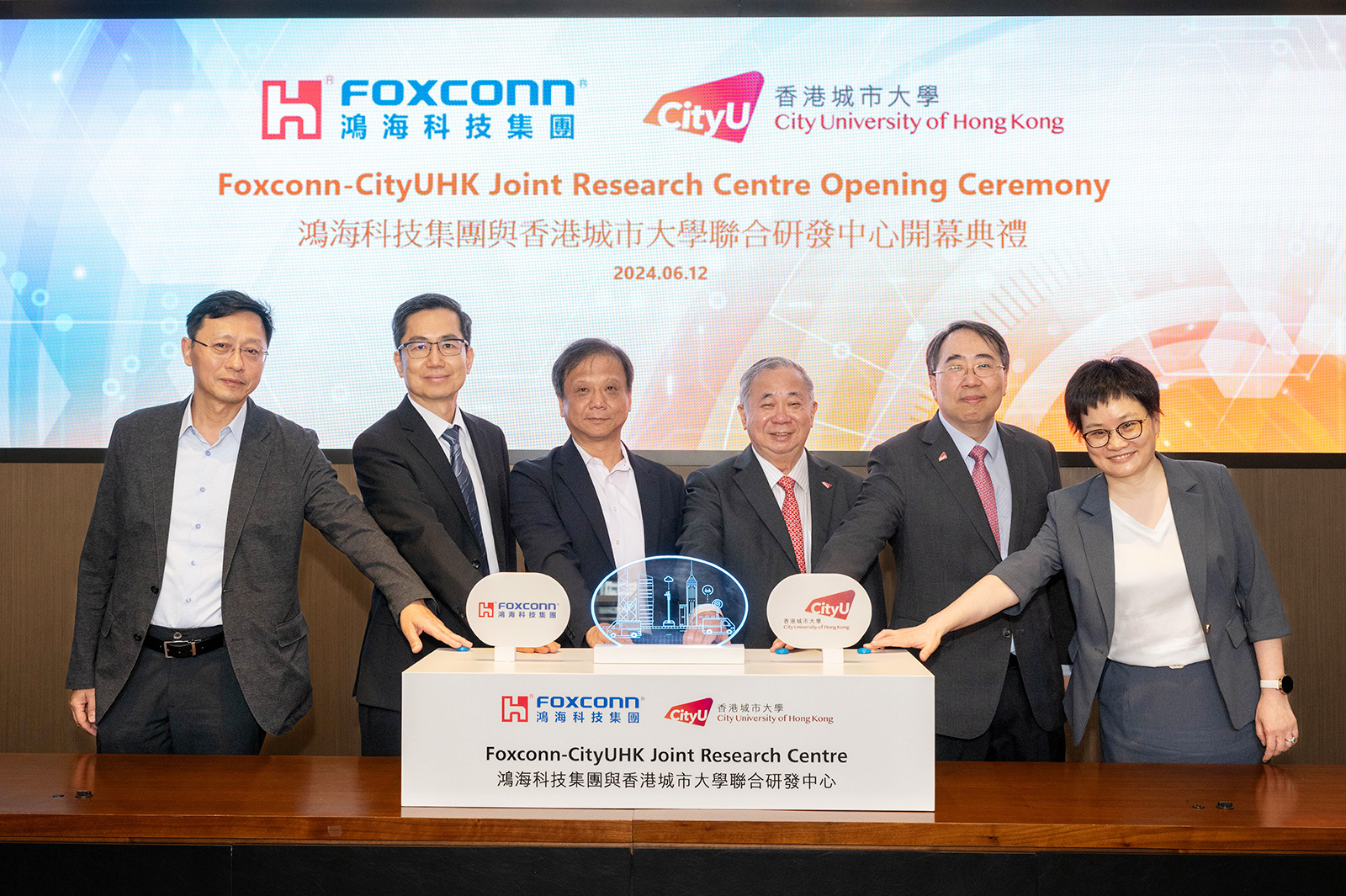 Officiating at the opening ceremony of the Foxconn-CityUHK Joint Research Centre are President Boey (third right), Dr Lee (third left), Professor Ma (second left), Professor Kuo (first left), Professor Lee (second right) and Professor Wang (first right).