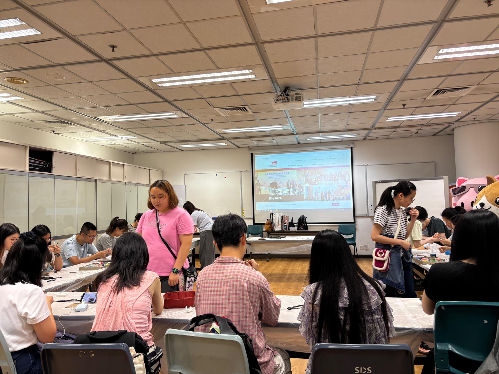 The instructors were teaching the students how to make leather products.