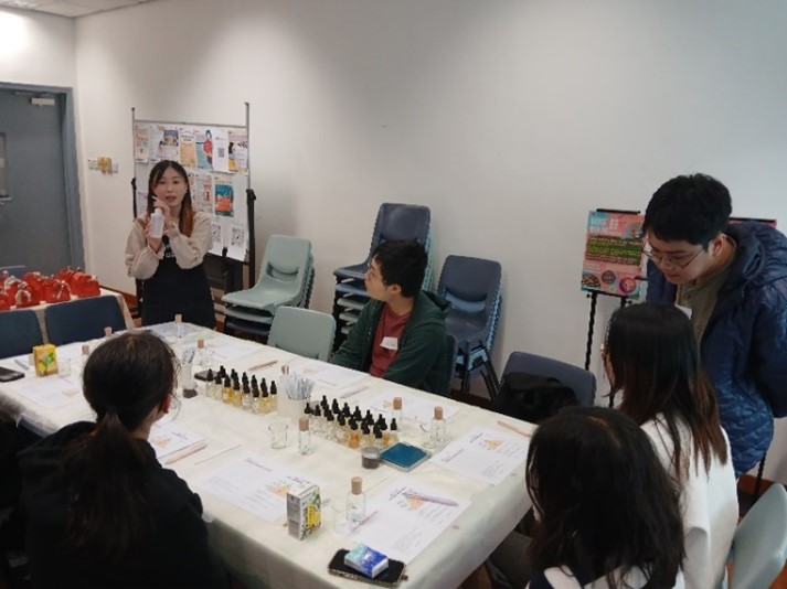 The instructor was teaching students how to mix own perfume.