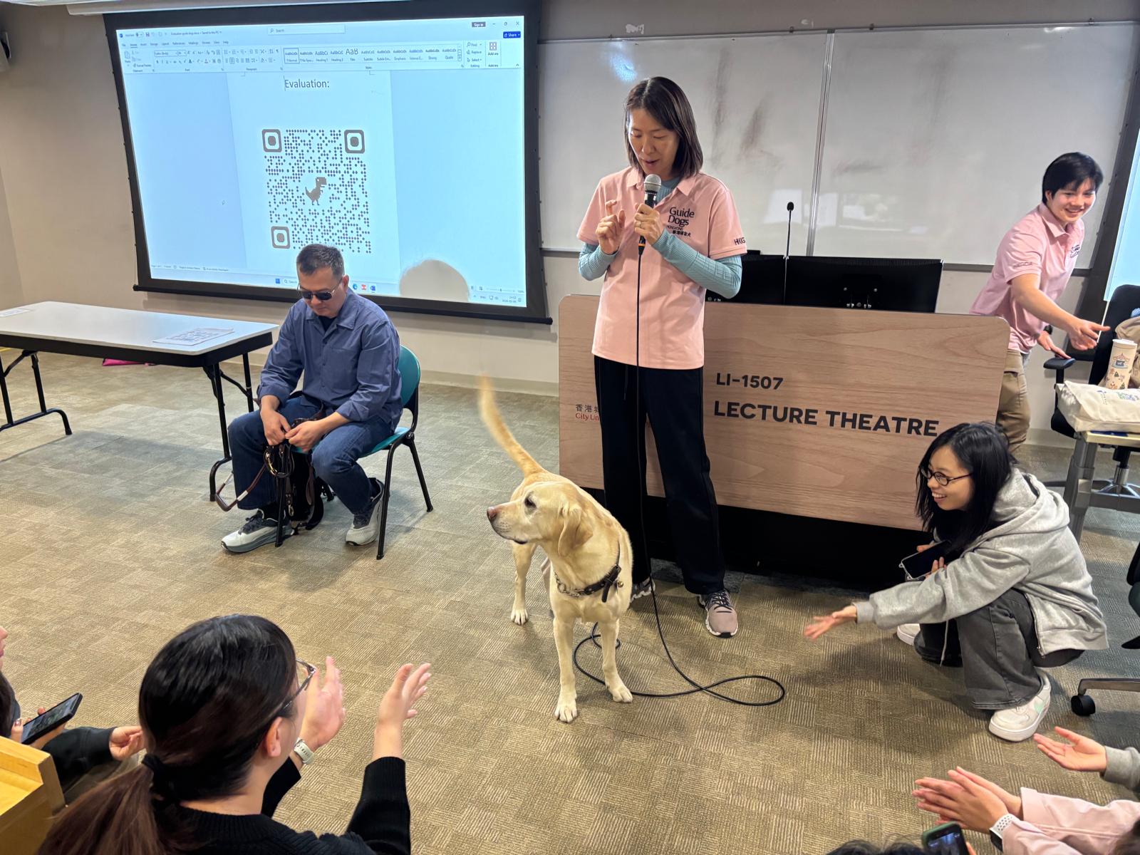 The students were playing with the guide dog.