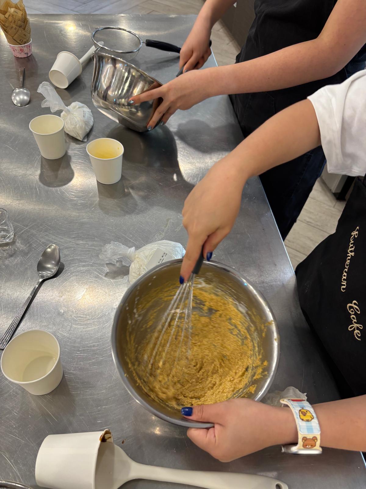 The students were making blueberry muffin.