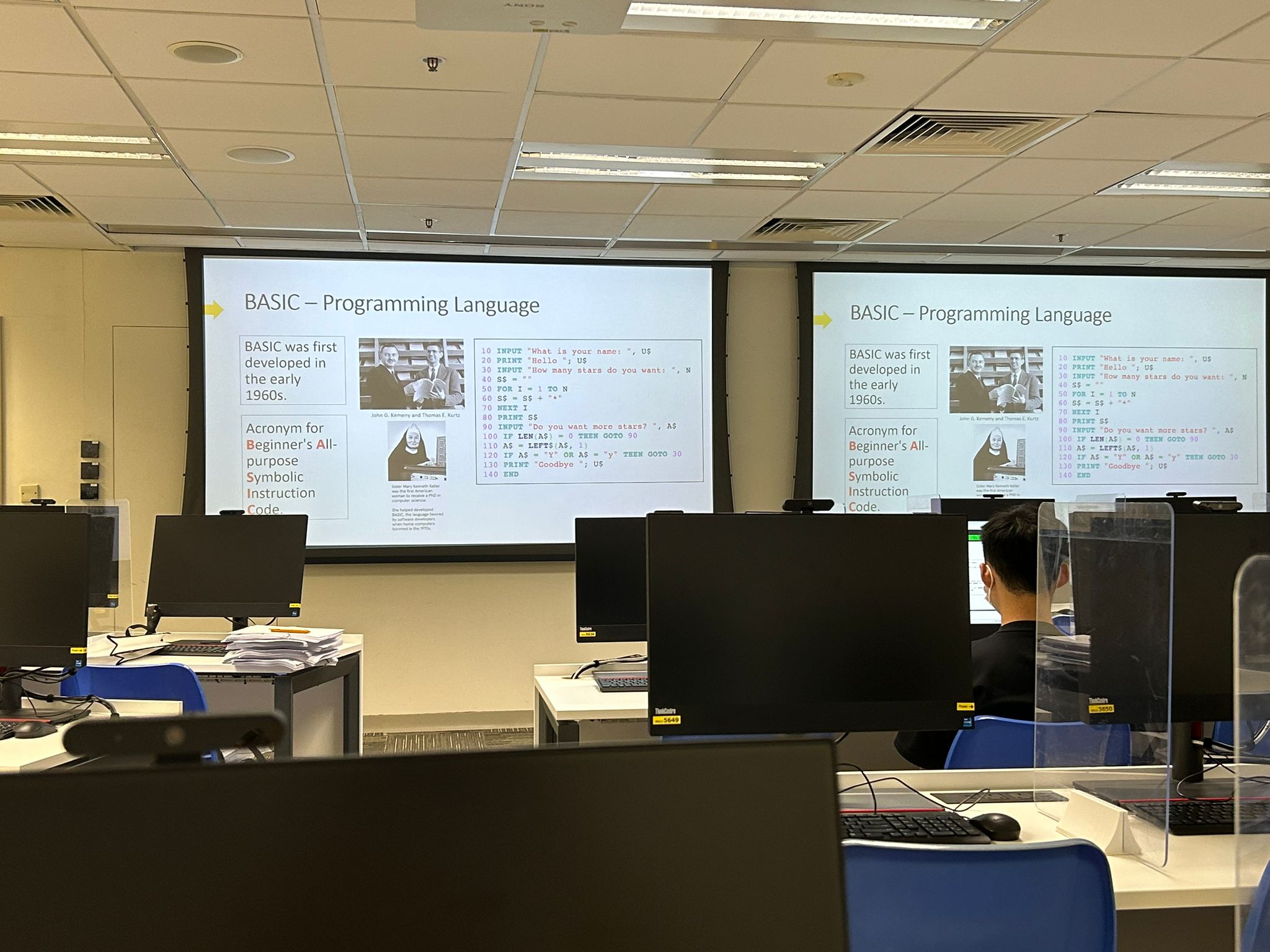 The trainer was teaching the students on the history of Macro Programming.  導師正在為學生們講解巨集程式設計的歷史。