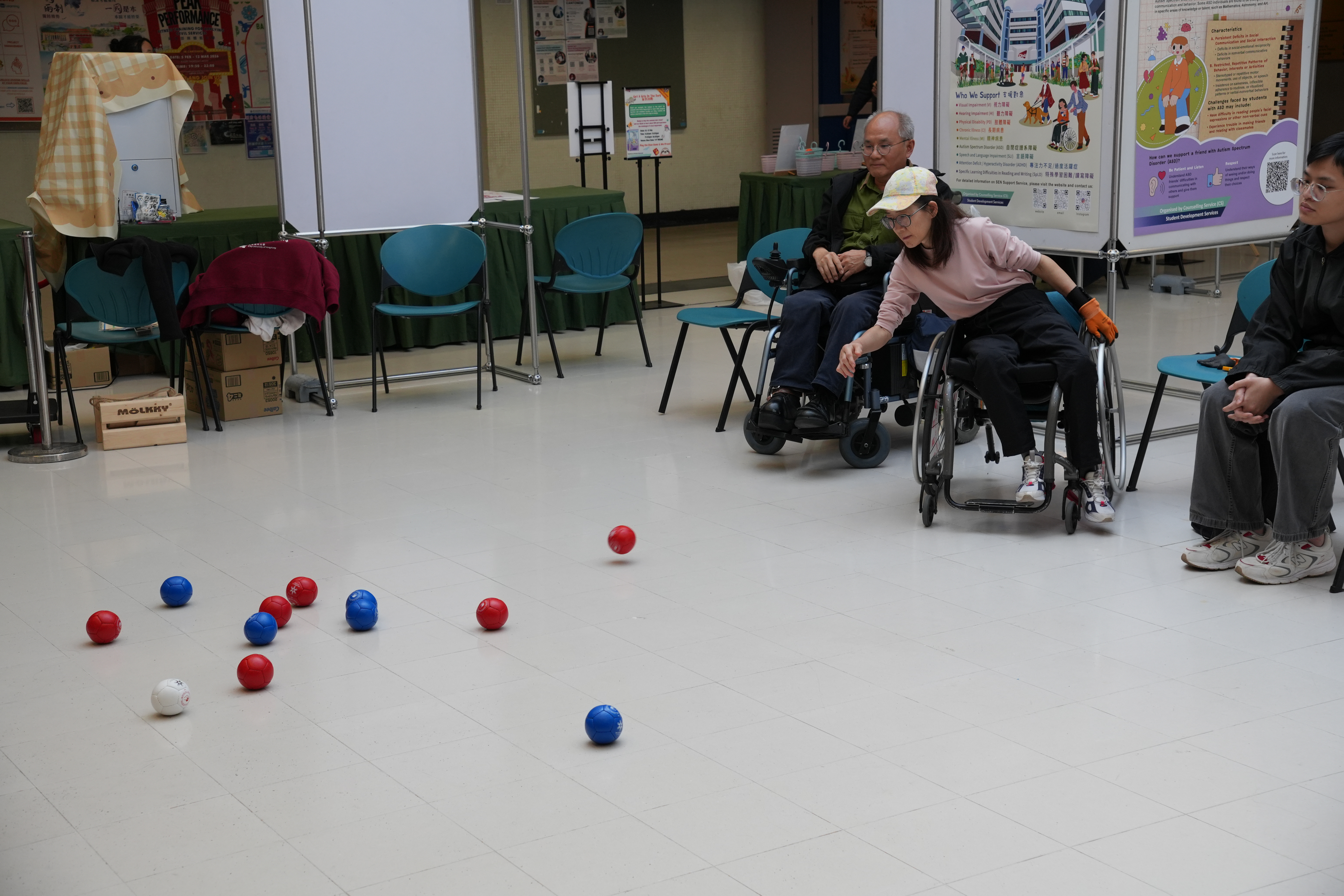 The instructor and the students were playing boccia.