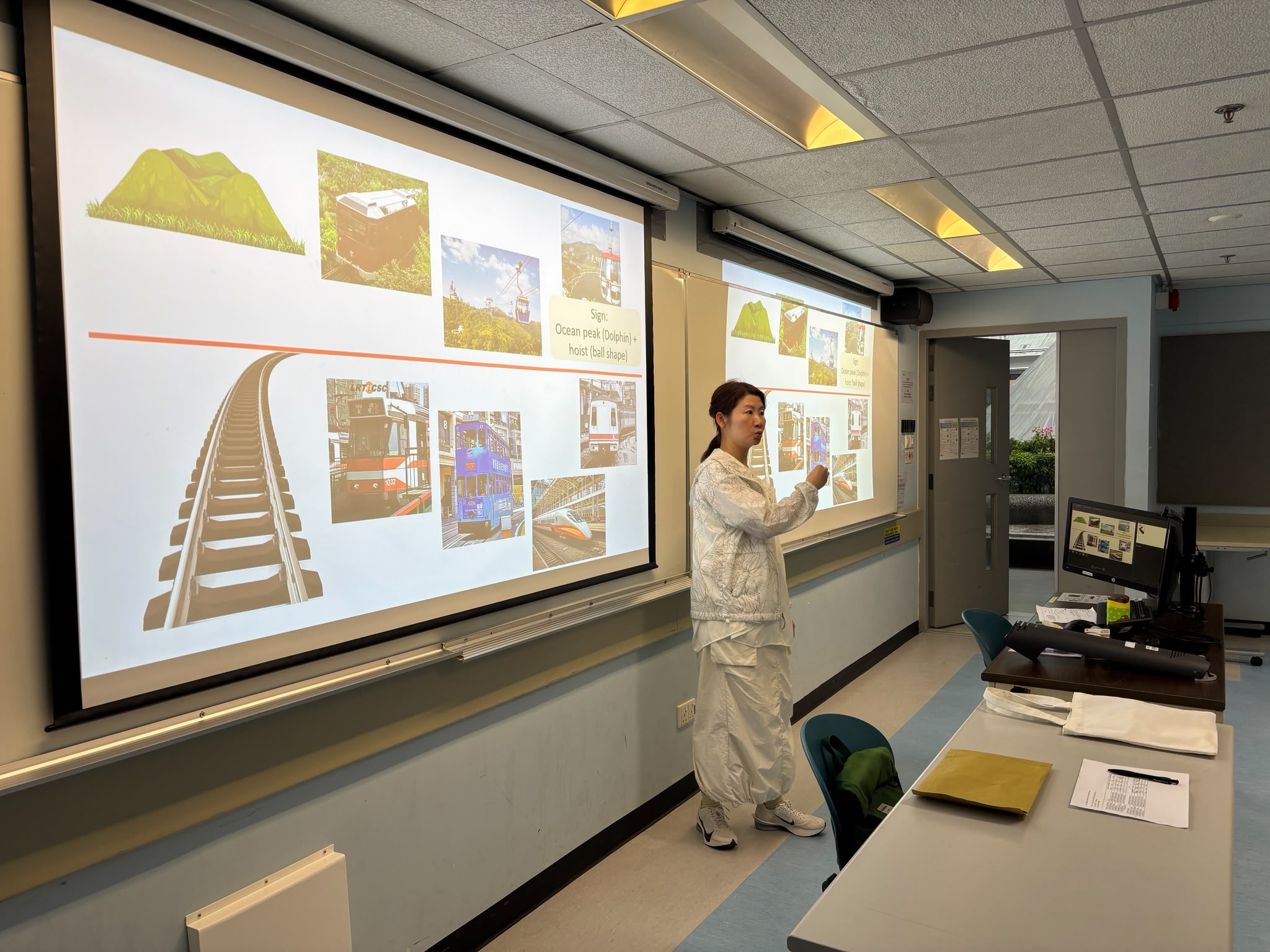 The deaf instructor was demonstrating signs for different modes of transportation.