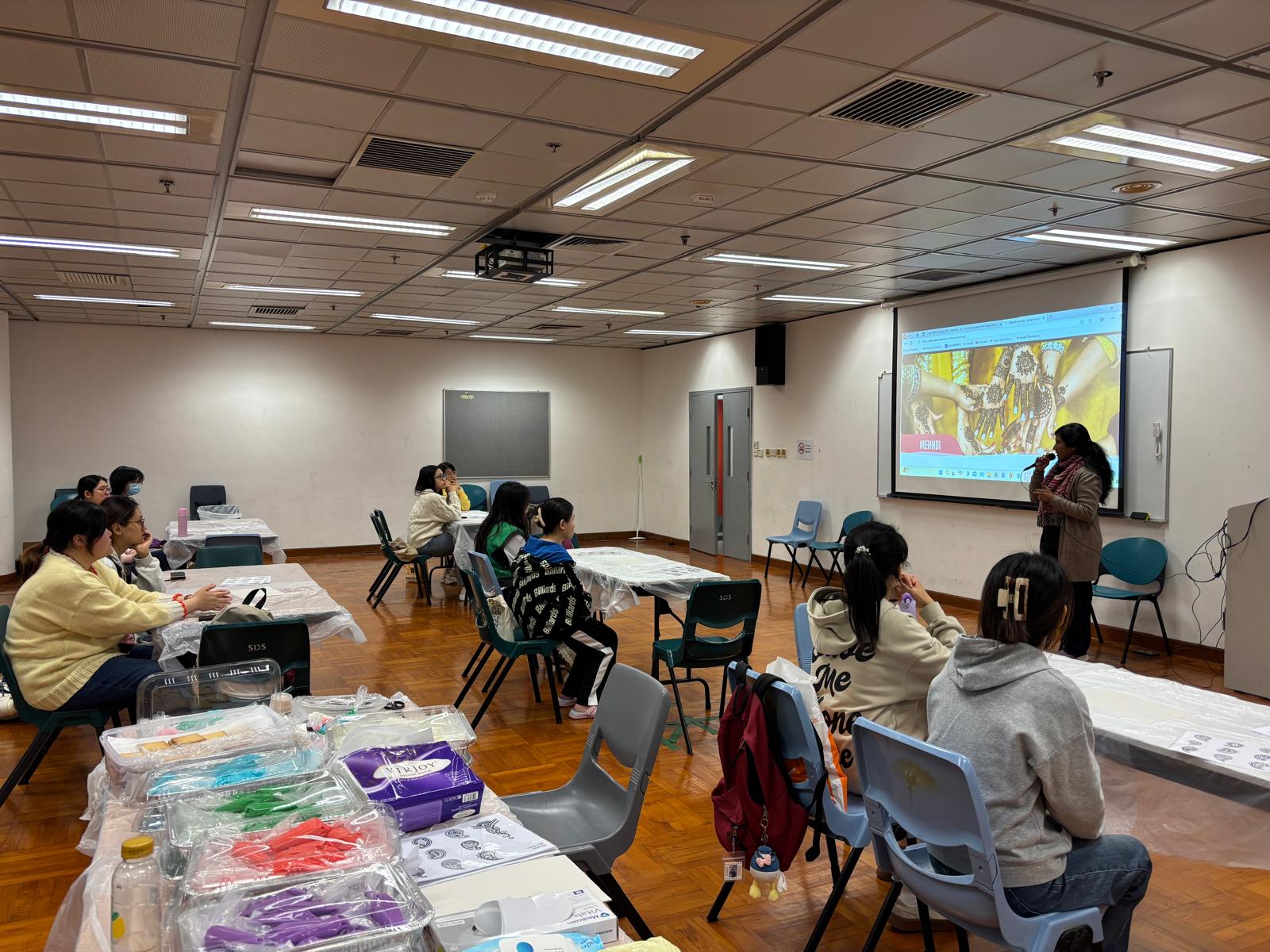 The instructor was introducing the background and history of Henna art.
