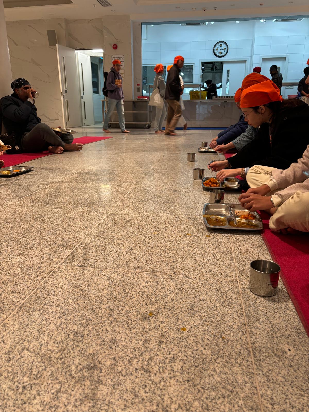 The students were tasting vegetarian meals at the Sikh temple.