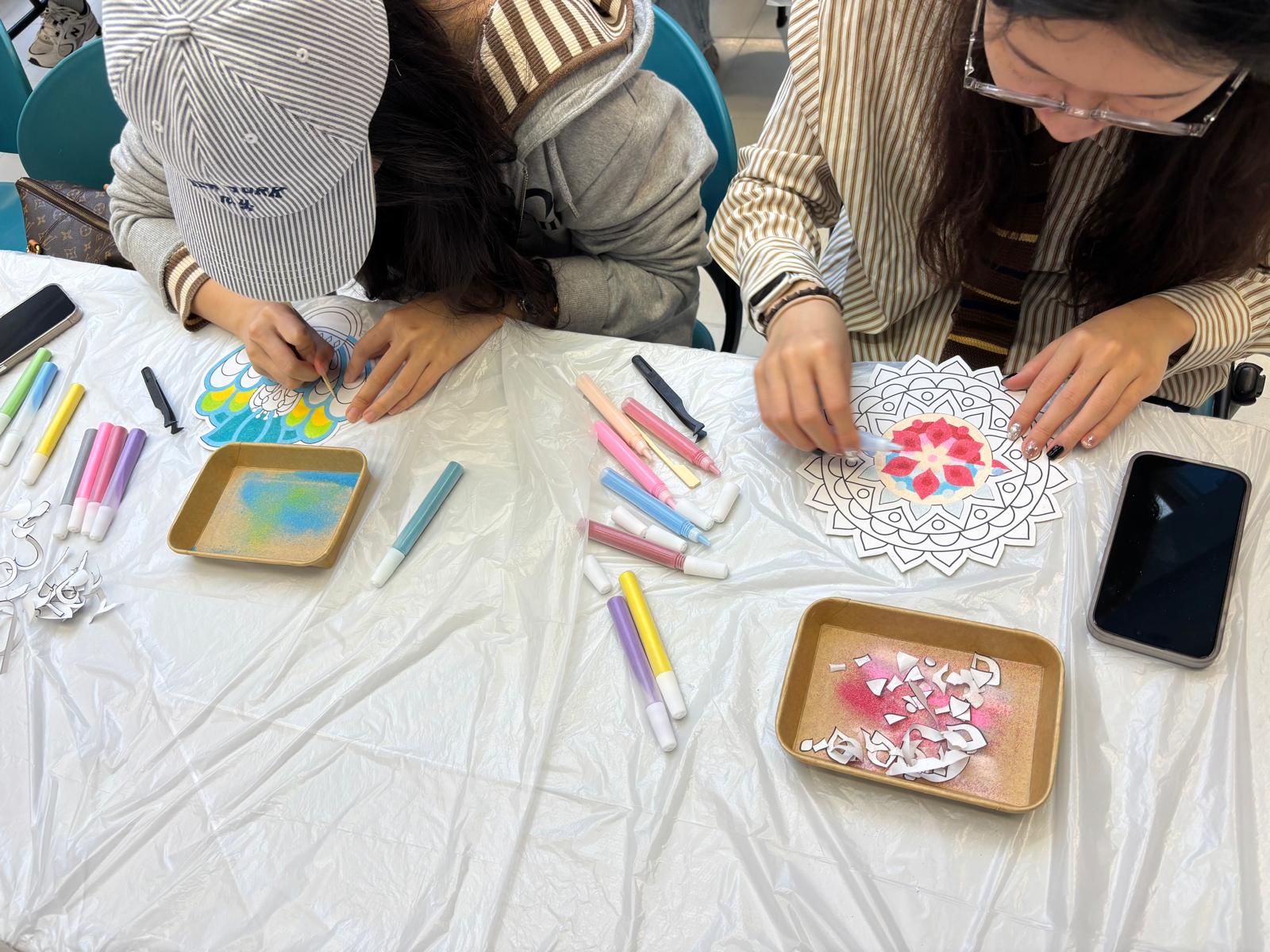 The students were making rangoli art.