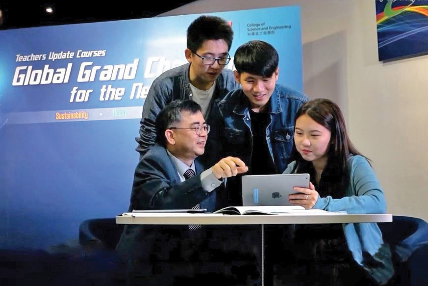 Professor Ho (front row, 1st left) provides guidance on cross-disciplinary activity.