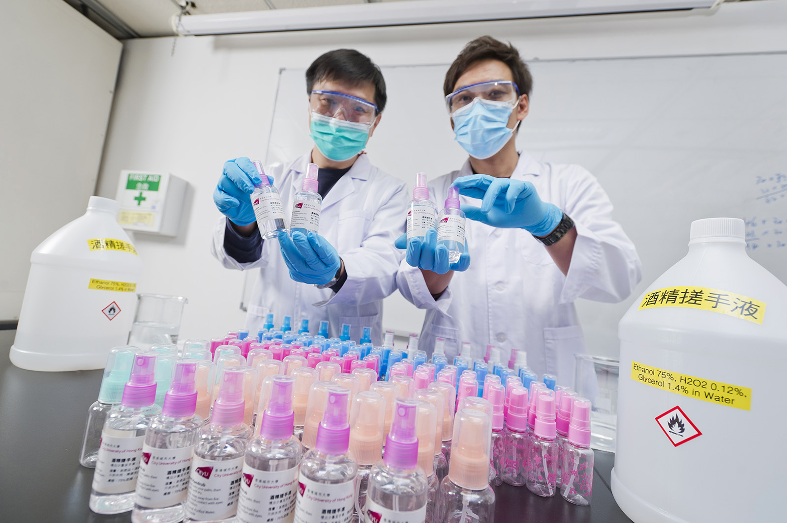 Professor Michael Lam Hon-wah (left) suggests applying a small amount of the alcohol-based handrub to the palms and thoroughly rubbing both hands until they are dry.