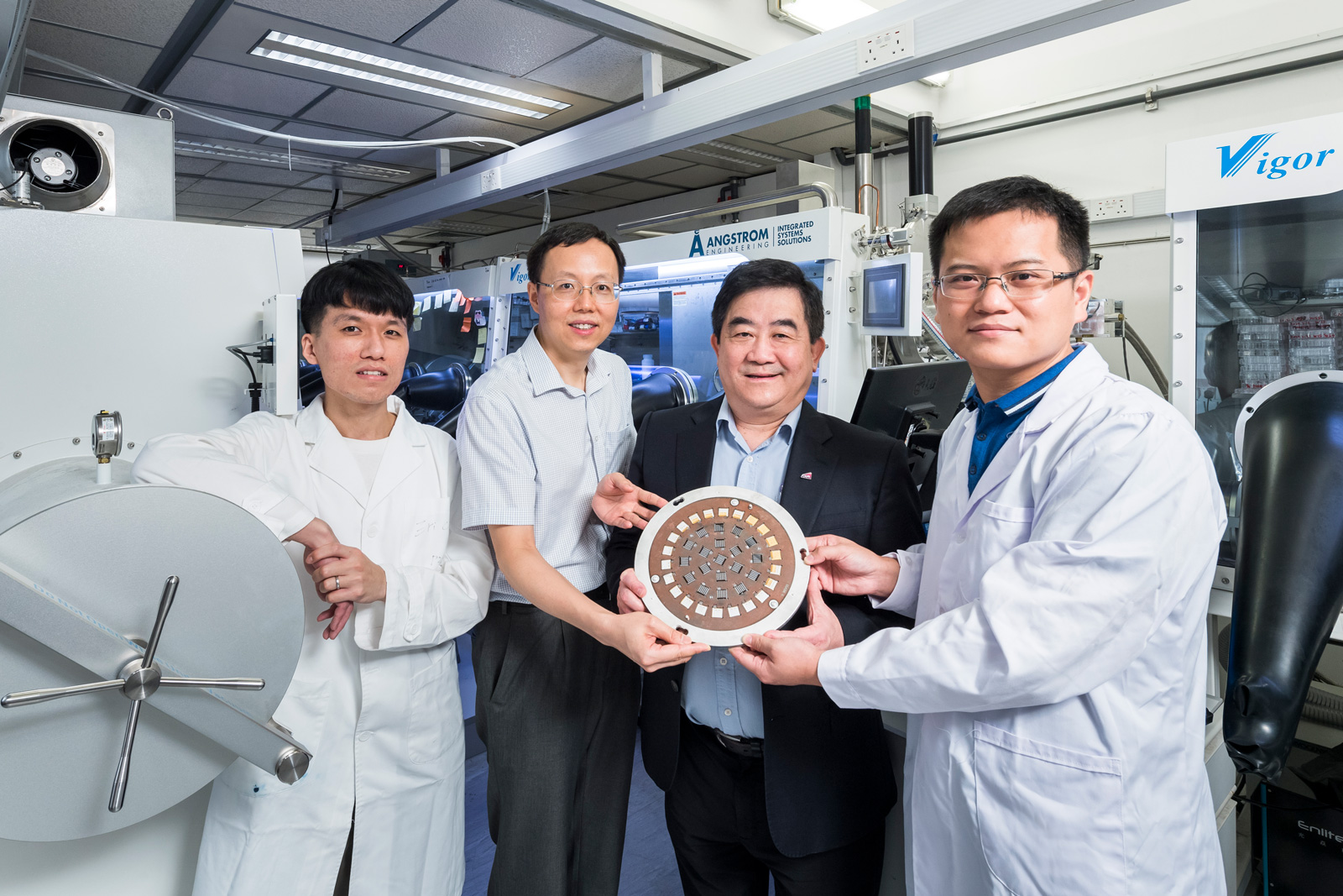 Key members of the research team: (from left) Wu Shengfan, Professor Xu Zhengtao, Professor Alex Jen Kwan-yue, and Dr Zhu Zonglong.