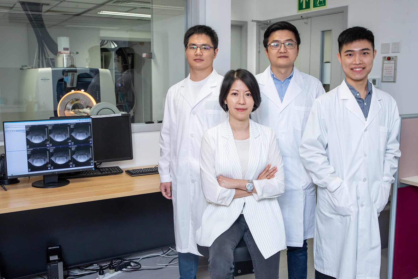 Dr Kannie Chan (front) and her team (back row, from left) Han Xiongqi, Huang Jianpan and Joseph H. C. Lai are collaborating with other scientists to develop a new imaging approach based on CEST MRI for early detection of Alzheimer’s disease.