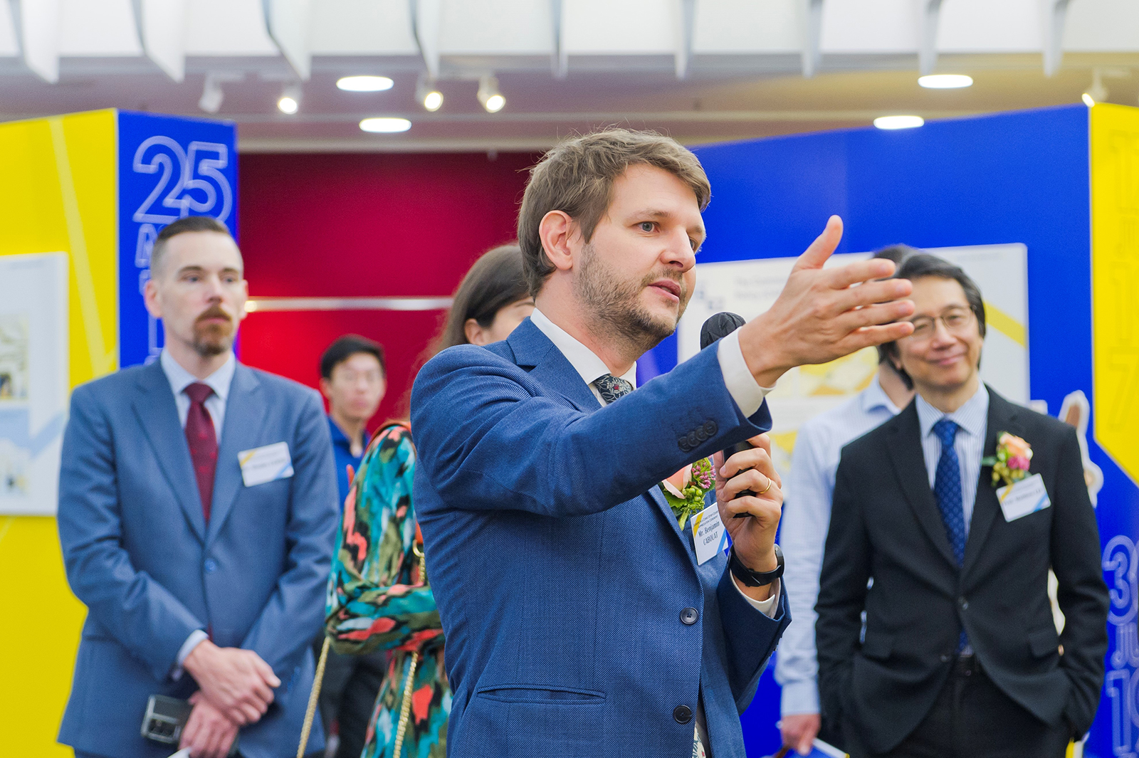 Mr Cabouat guided distinguished guests around the exhibition after the opening ceremony. 