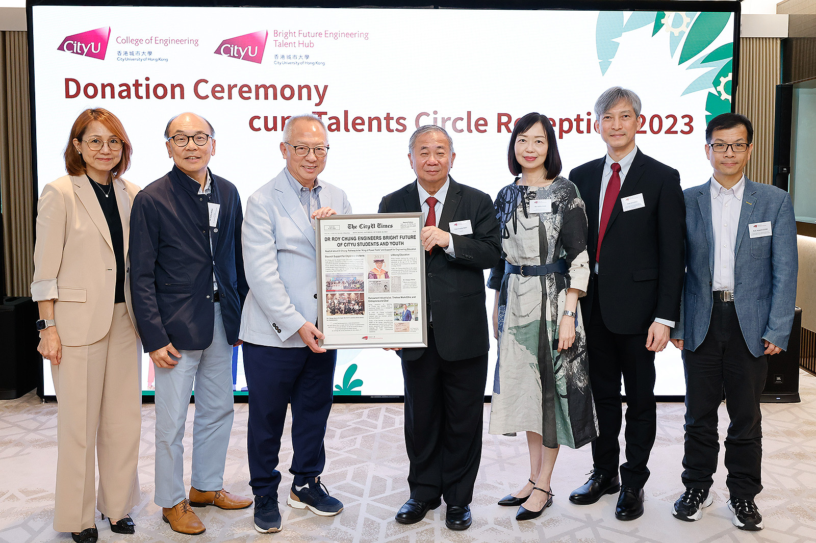 President Boey (middle), together with Professor Leung (first from right), Professor Shek (second from right), and Ms Kathy Chan (third from right), presented a souvenir to Dr Chung (third from left) and representatives from the Bright Future Charitable Foundation.