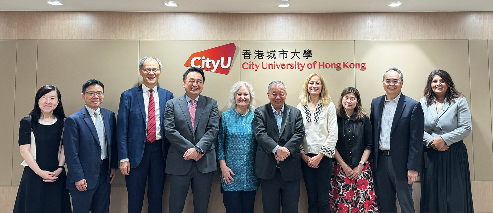 (From left) Professor Dai, Professor Ho, Professor Lin, Professor Li, Professor Gravett, President Boey, Professor Rodny-Gumede, Ms Ng, Professor Yue and Ms Khan.