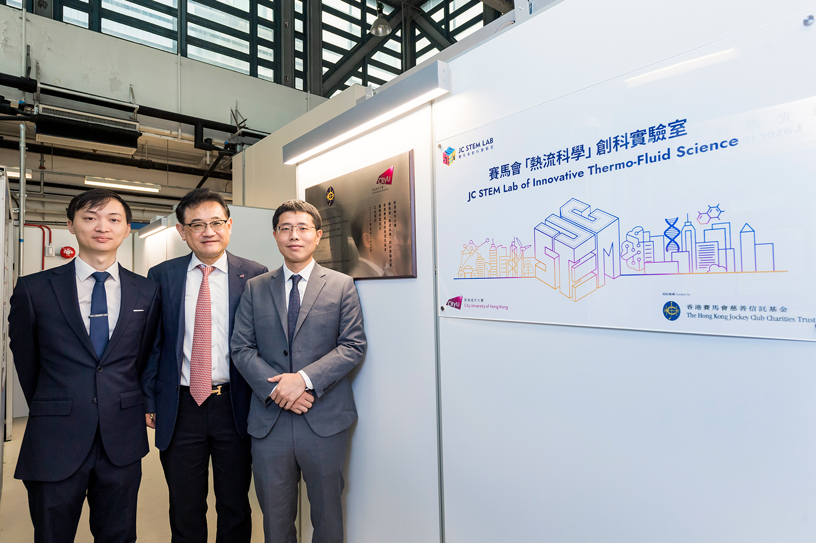 Professor Hibiki (centre); Postdoctoral Fellows of the Lab, Dr Eric Lau Kwun-ting (first left) and Dr Zhang Hengwei (first right).