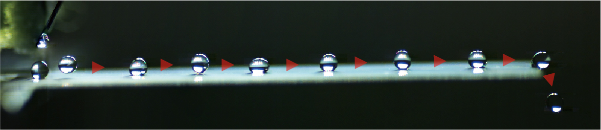 Droplet transport by surface charge density gradient