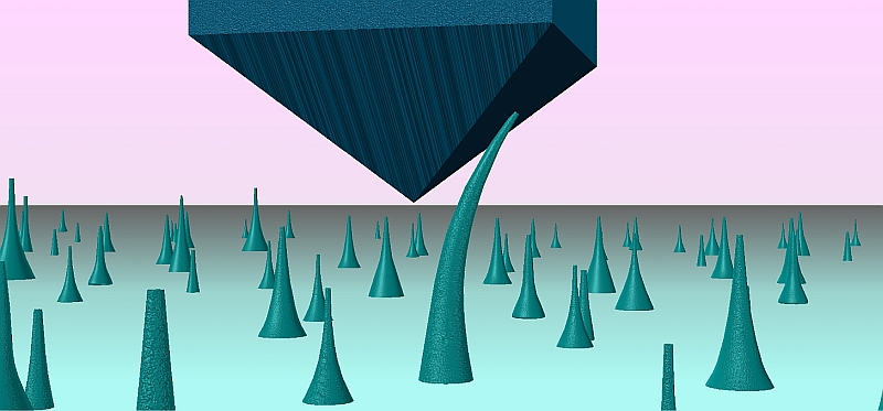 A schematic diagram showing the “push to bend” nanomechanical test on a diamond nanoneedle.