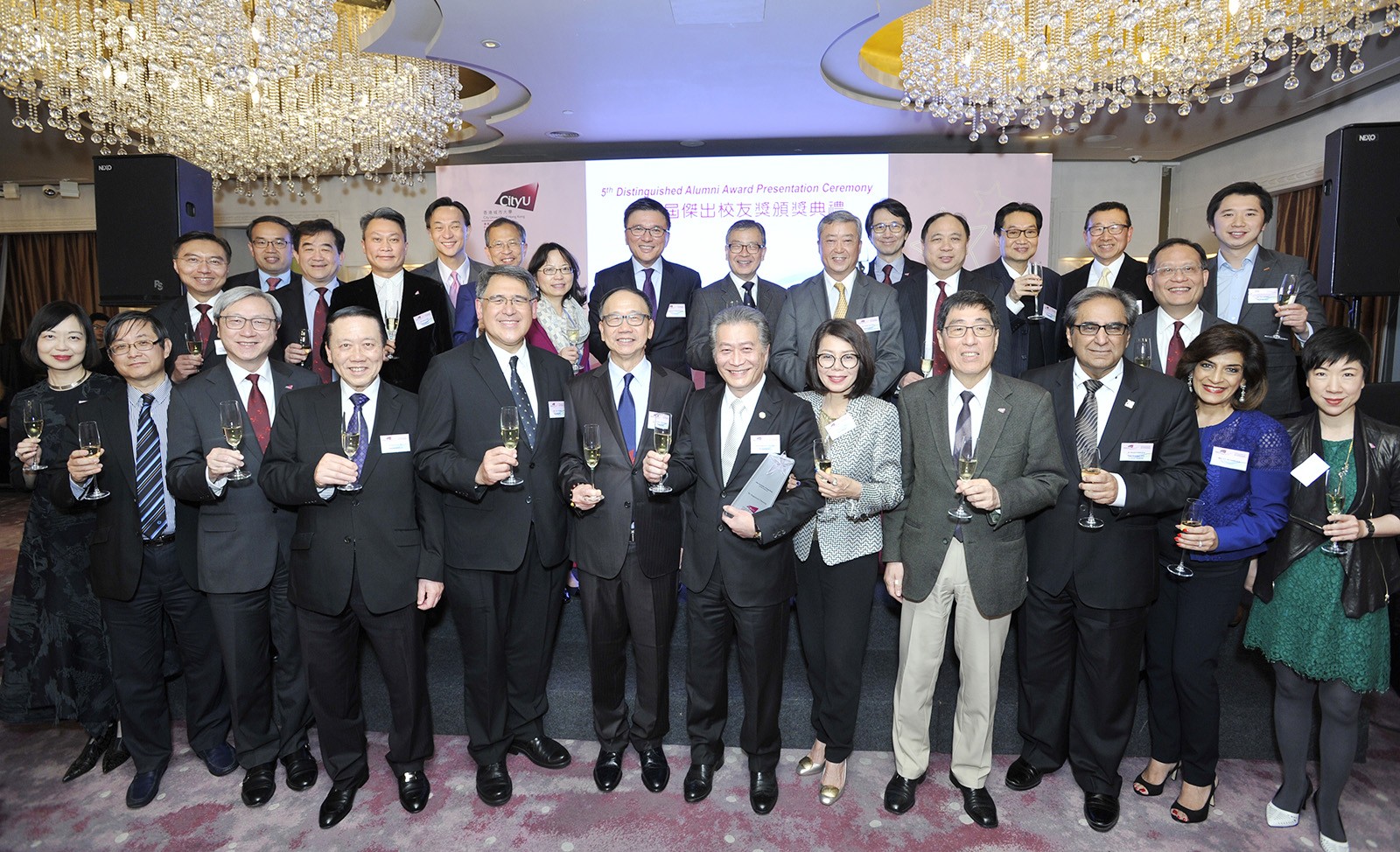 Guests toast to the future success of CityU. 
