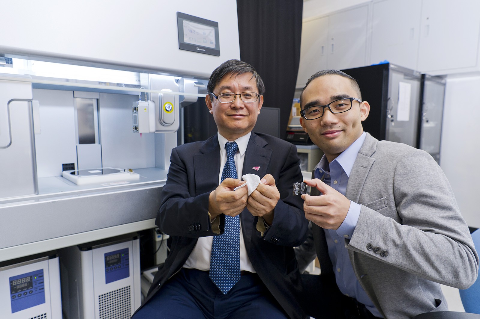 Professor Lu Jian (left), Dr Liu Guo and the research team have developed the world's first-ever 4D printing for ceramics.