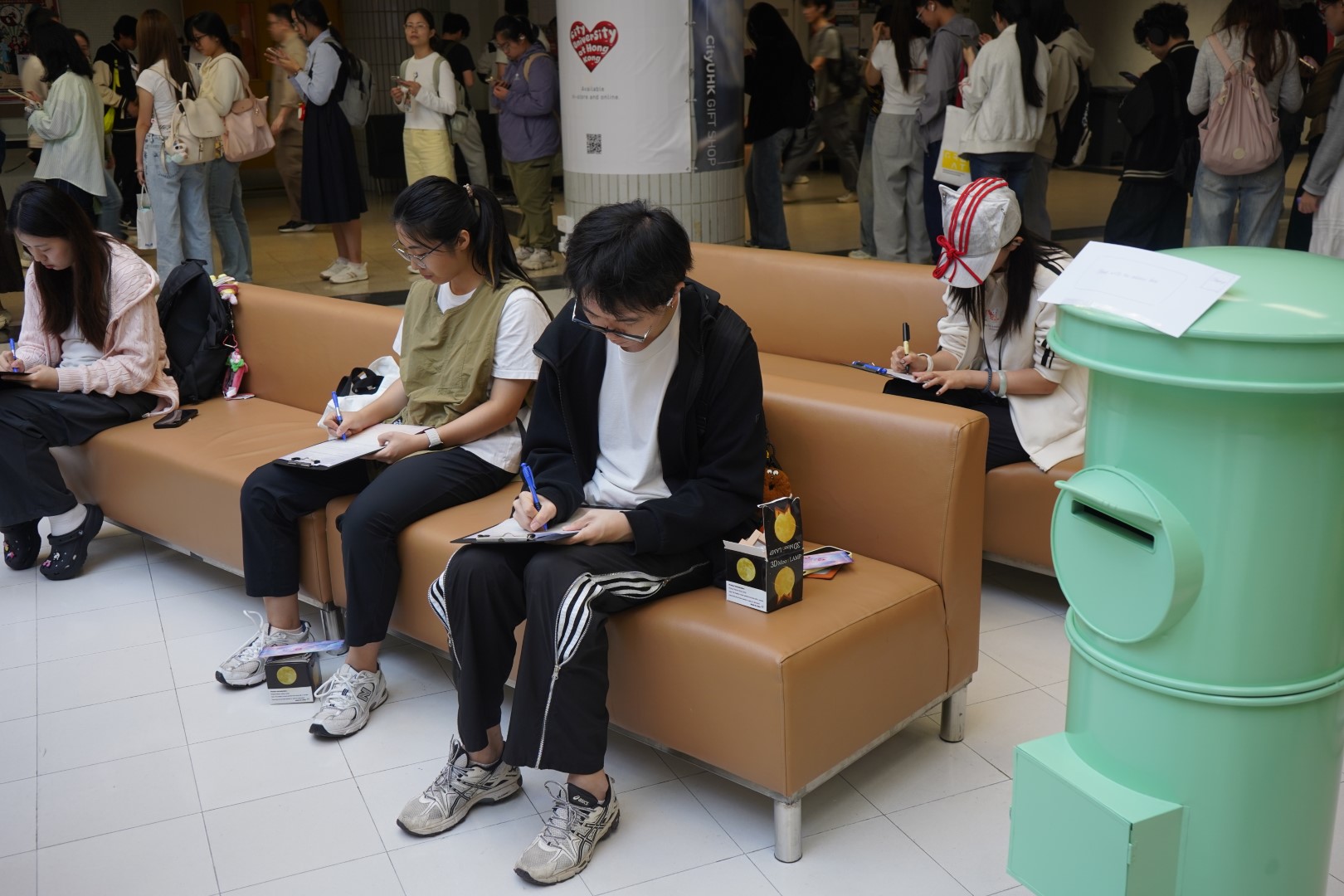 Students engaged in crafting luna lamps as a way to express their possessions, love, and aspirations. 