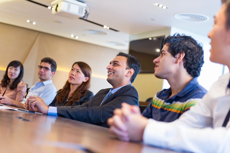 Staff and students listening at a CityUHK briefing session